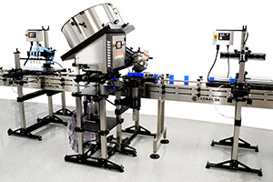 Our fully automatic bottling lines feature the Kinex QuickFeed™ cap feeder, which completely automates the cap sorting, feeding, and placing operations.