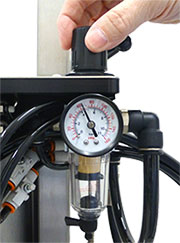 adjusting clamp pressure on the PumpCap Capping Machine